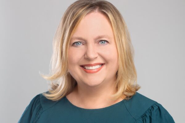 New executive director smiles in professional photo