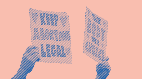 Two signs are being held at a protest. The first sign says "Keep Abortion Legal". The second sign says "Their Body Their Choice"