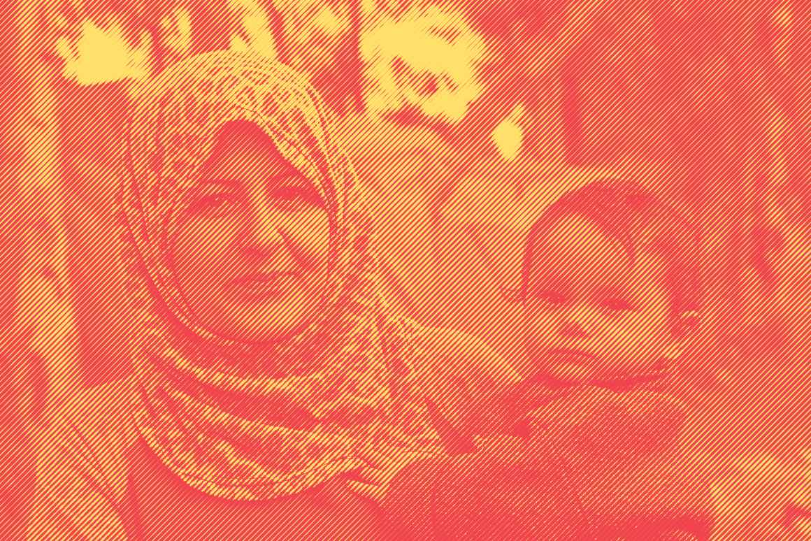 hijabi woman with young child in arms