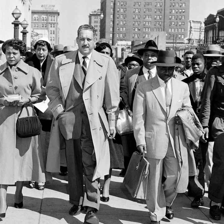 Autherine Lucy, left, front, 26-year-old student at the University of Alabama, arrives at U.S. District Court for the hearing of her petition for an order requiring the school to re-admit her to classes in Birmingham, Ala., Feb. 29, 1956. With Lucy are...